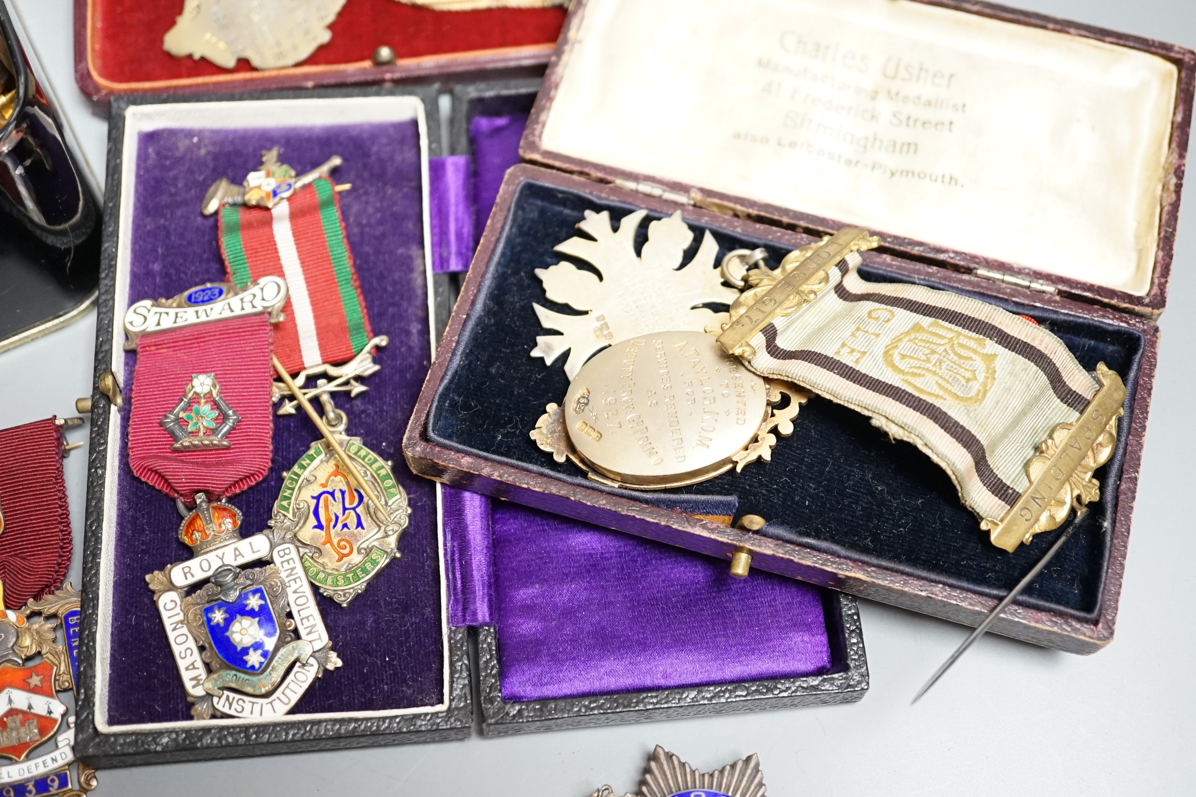 A collection of silver or gilt metal and enamel Masonic medals